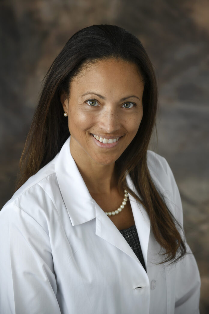 Nathalie McKenzie Headshot Lab Coat